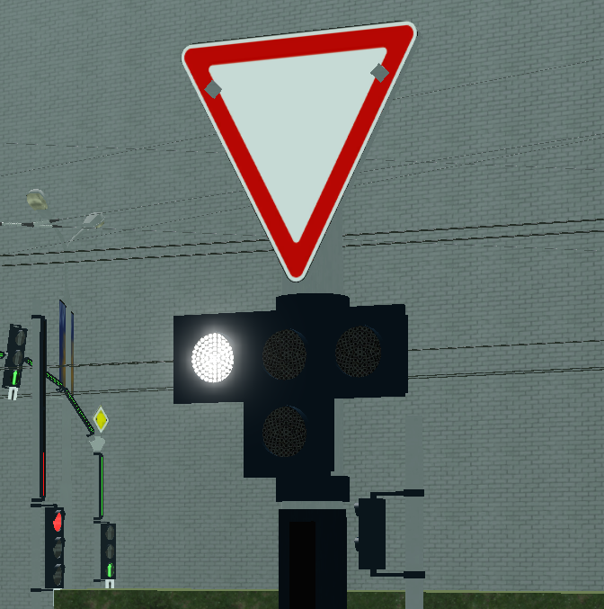 Lower light of the tram traffic light is flashing. | Нижний свет трамвайного светофора моргает.